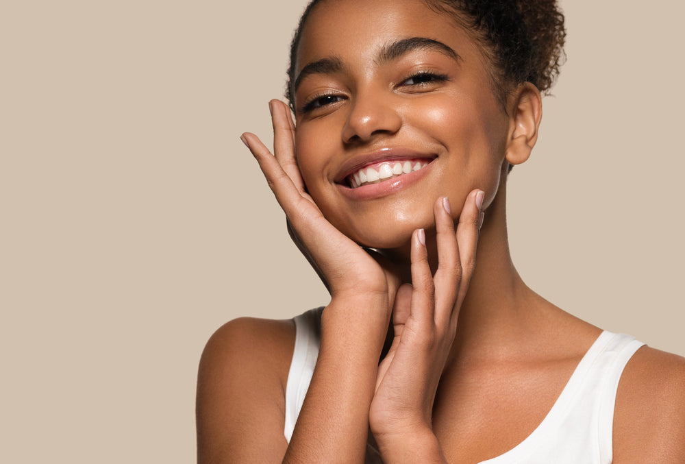 Young Black woman with glowing skin