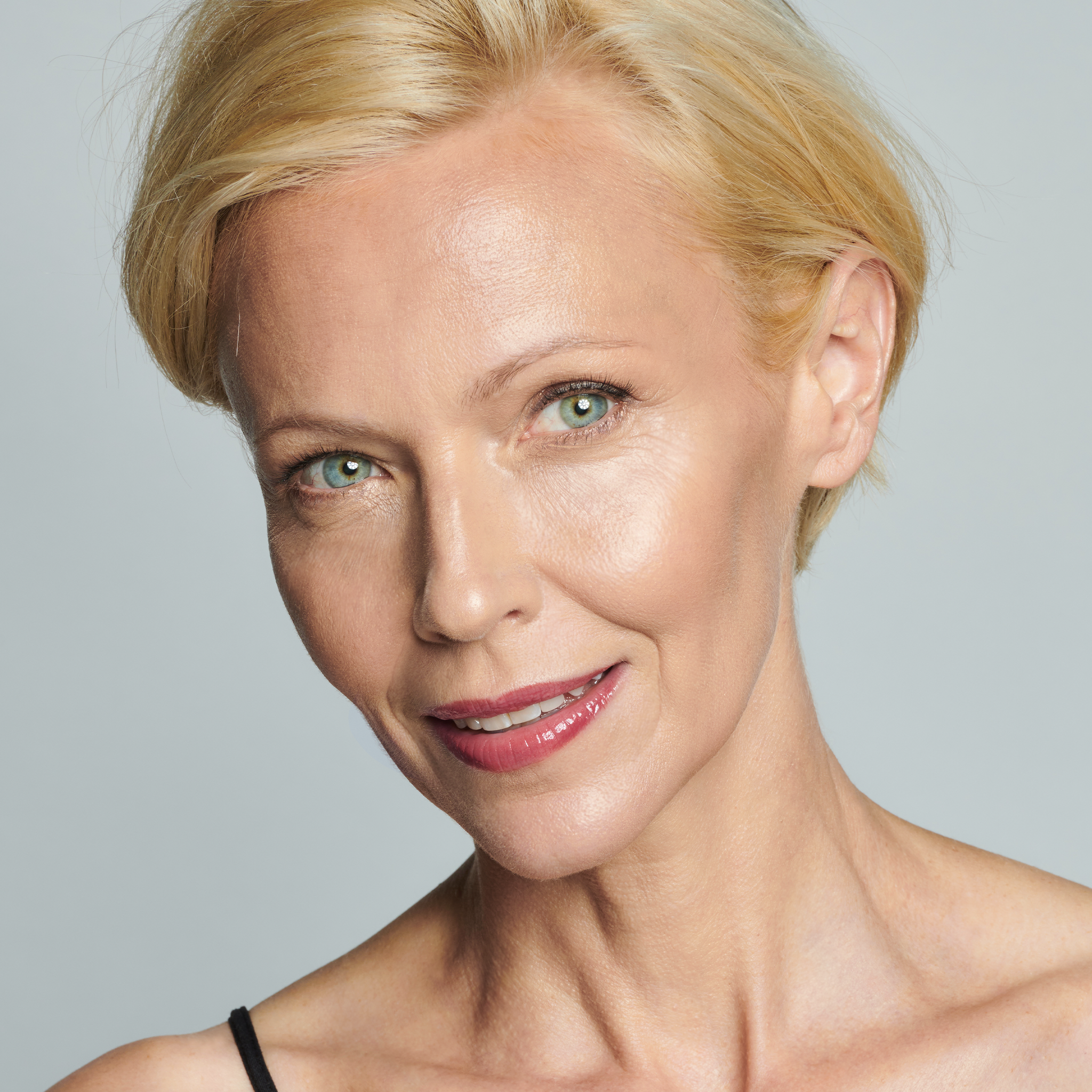 model wearing Lip Shine Scarlet || all