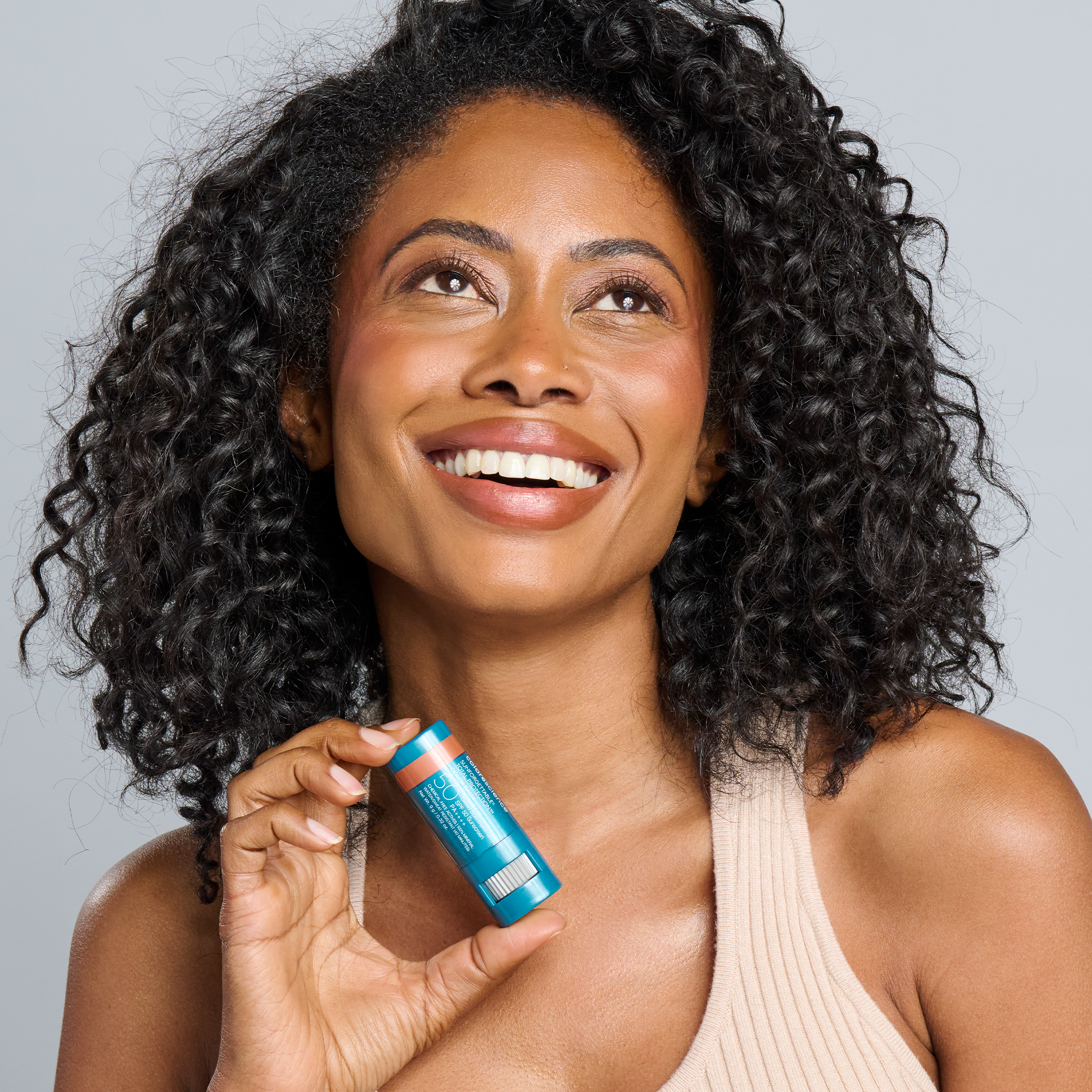 Sunforgettable® Total Protection™ Color Balm SPF 50 on Model || Bronze