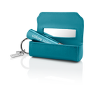 Brush holder open with sunscreen brush inside || all
