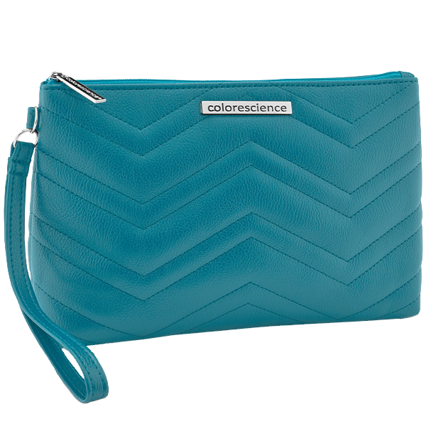 Teal clutch with Colorescience hardware on white background | all