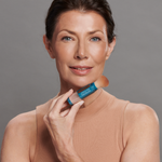 Model wearing Sunforgettable® Total Protection™ Brush-On Shield Bronze SPF 50 || all