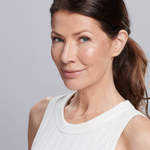 Model wearing Sunforgettable® Total Protection™ Brush-On Shield Glow SPF 50 || all