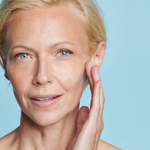 face of female model after applying even up serum || all