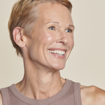 Model wearing All Calm® Multi-Correction Serum || all