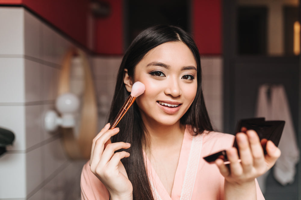 Woman displaying how to apply makeup to your face