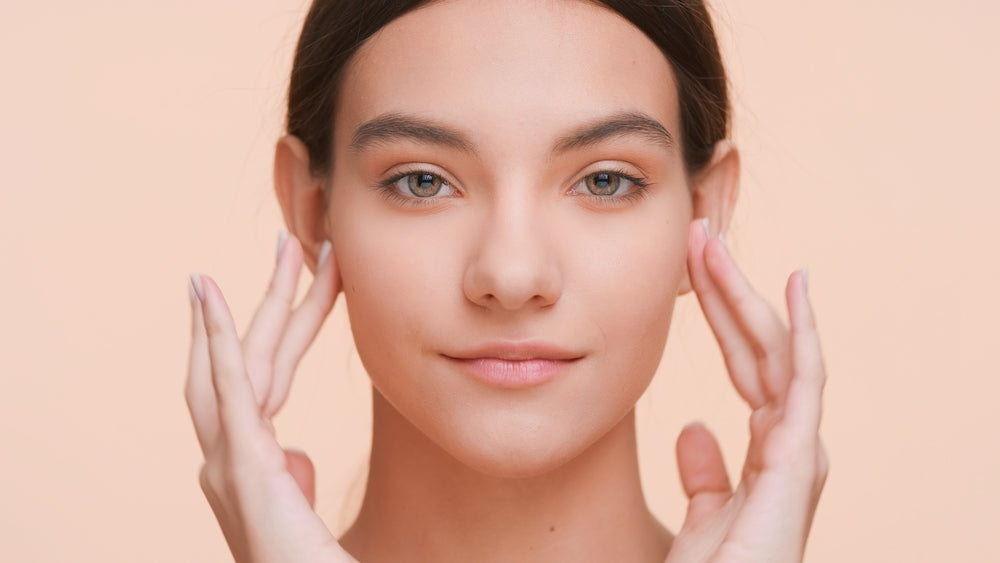 Woman with smooth, matte complexion