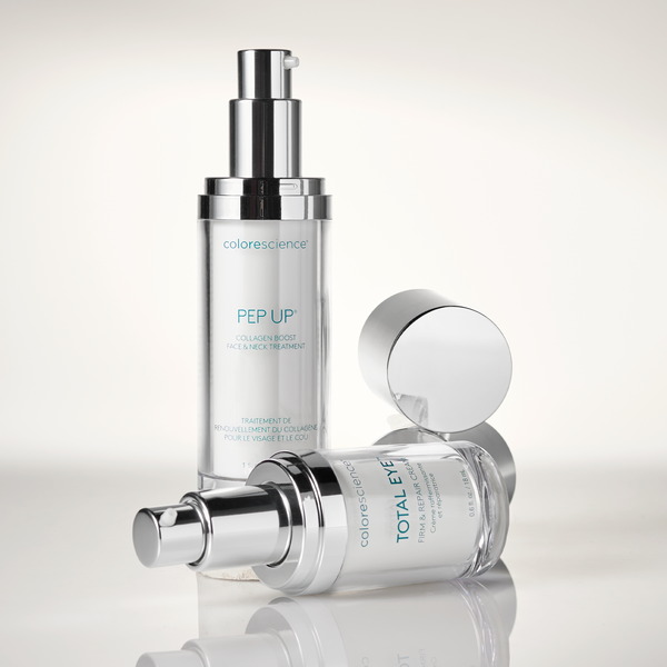 Collection of Colorescience skincare products on a light gray background
