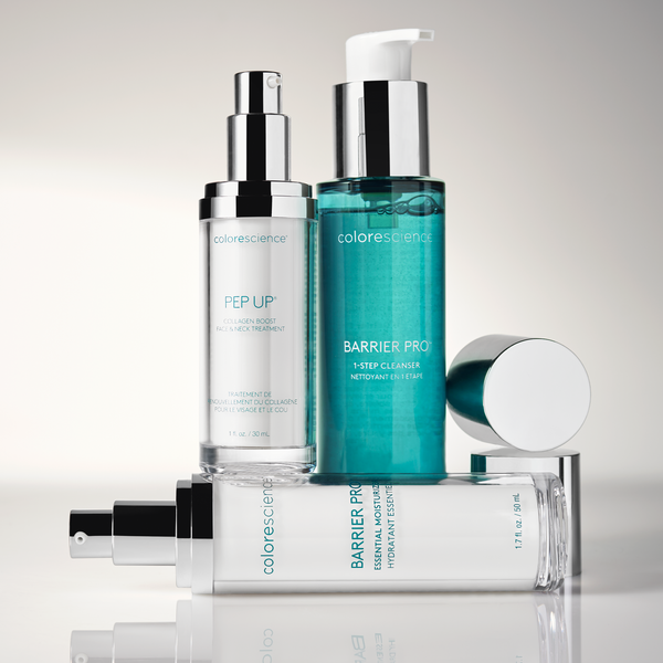 Collection of Colorescience skincare products on a light gray background
