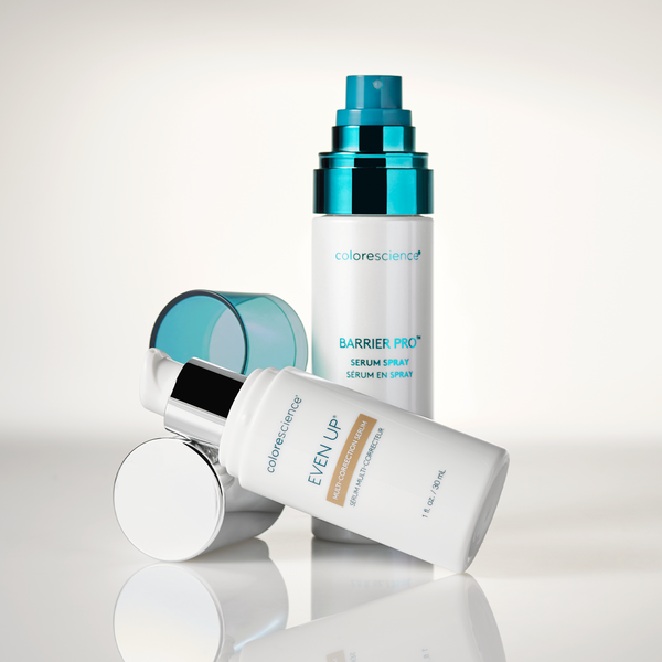 Collection of Colorescience skincare products on a light gray background
