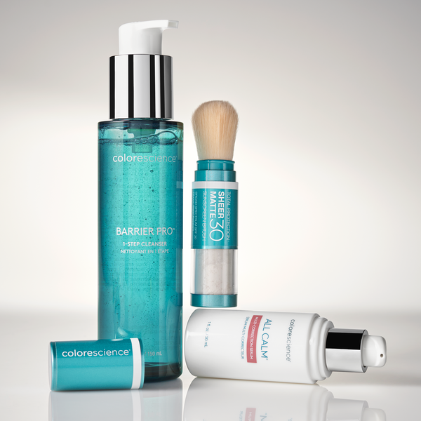 Collection of Colorescience skincare products on a light gray background
