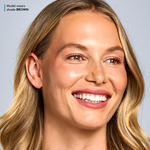 model wearing Total Lash® Serum Mascara in Brown