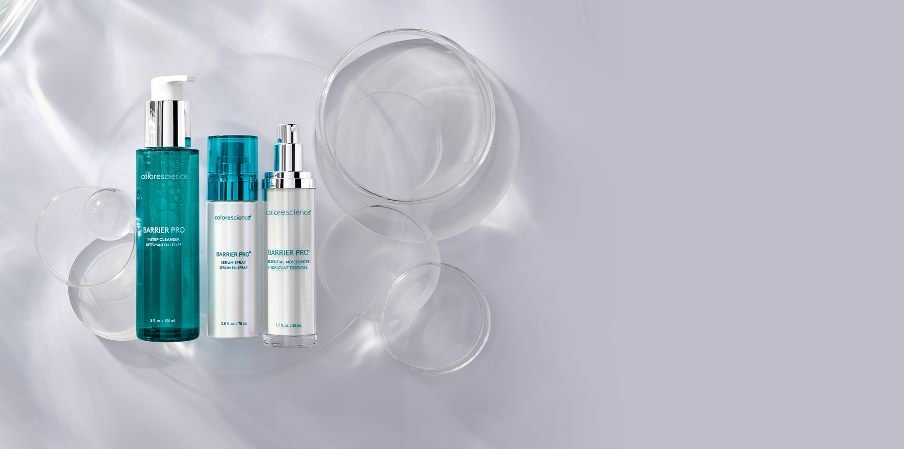 Hero Banner for Colorescience Barrier Pro™ skincare bottles . The products include Barrier Pro™ Cleanser,  Barrier Pro™ Serum Spray and  Barrier Pro™ Moisturizer.
