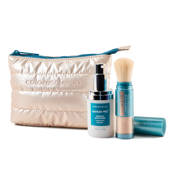 Protect & Glow Essentials Holiday Kit, featuring a limited-edition travel mini Colorescience® Barrier Pro™ Essential Moisturizer & Best-selling Total Protection® Brush-On Shield SPF 50 Glow with patented EnviroScreen® 5-Point Protection.  Includes a FREE puffy pouch.