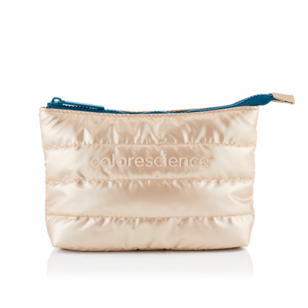 Puffy pouch with Colorescience® logo and teal top zipper.