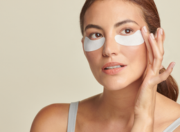 Woman wearing Total Eye Hydrogel Treatment Masks