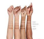 Four forearms of female models of Fair, Medium, Tan and Deep skintone with Face Shield Flex swatches of each four shades || all