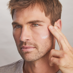 Model applying Total Protection™ Model wearing No Show™ Mineral Sunscreen SPF 50