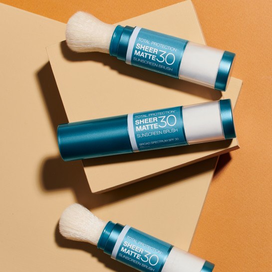 three Sunforgettable® Total Protection™ Sheer Matte SPF 30 Sunscreen Brushes